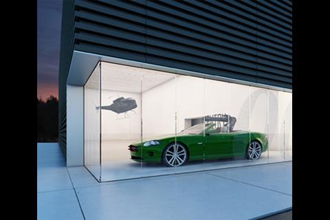 The building is clad in black horizontal corrugated metal